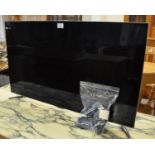 Samsung 40" TV on chrome stand, with remote. (B.P. 21% + VAT)