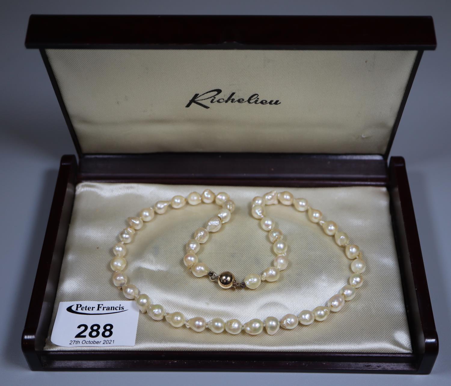 Baroque pearl necklace with 9ct gold ball clasp. (B.P. 21% + VAT)