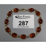 Modern amber bracelet set in 14ct gold. (B.P. 21% + VAT)