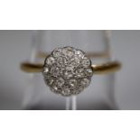 18ct gold and diamond cluster ring. Ring size P. Approx weight 2.3 grams. (B.P. 21% + VAT)
