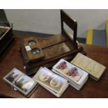Victorian walnut stereoscopic table slide viewer, with a small collection of stereoscopic card