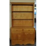 Modern well made beech rack-back dresser with two drawers over two panel cupboards. (B.P. 21% + VAT)