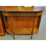 Edwardian style bow front console table with under tier on tapering fluted legs and ebonised finish.