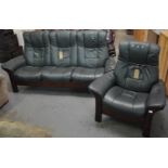 Modern green leather Scandinavian style three seater sofa with matching armchair made by '