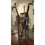 Early 20th Century oak barley twist stick and umbrella stand, comprising various carved and other