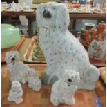 Tray of china seated fireside spaniels of various sizes to include; two pairs of Royal Doulton. (