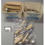 Box of assorted items to include; silver plated and other loose cutlery, brass letter embossers,