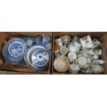 Two boxes of assorted china; to include various willow and other blue and white plates, meat