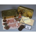 Two brass Christmas 1914 WWI tin boxes, interior revealing small collection of items including