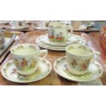 Tray of Royal Doulton 'Bunnykins' design teaware to include; two cabinet cups with saucers, mug