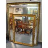 Two modern gilt frame bevel plate mirrors. Both with moulded foliate and beaded decoration. 102 x
