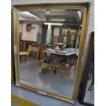 Large modern gilt frame bevel plate mirror with moulded foliate design. 131 x 104 cm approx. (B.P.