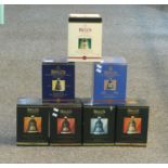 Seven Bell's old Scotch whisky porcelain decanters all in original boxes to include; Christmas '93 &