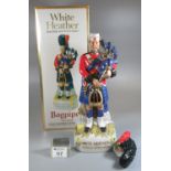 White Heather blended Scotch whisky bagpiper figurine/decanter in original box. Full and sealed. (