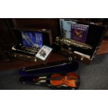 Modern student alto saxophone in original box, a Chinese students violin in hard case and a