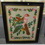 Large Berlin woolwork panel depicting a parrot on a branch within a foliate border, bearing initials