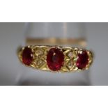 18ct gold garnet and diamond ring. Ring size Q&1/2. Approx weight 3.1 grams. (B.P. 21% + VAT)