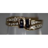 14ct gold diamond and sapphire ring. Ring size L. Approx weight 2.6 grams. (B.P. 21% + VAT)