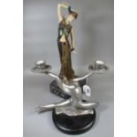 Composition Art Deco figurine of a lady on marble finish base, together with a modern silver