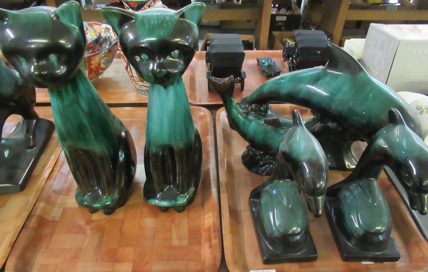 Four trays of Canadian hand crafted Blue Mountain pottery to include: figurines of dolphins, cats,