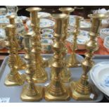 Tray of brass candlesticks of various shapes and heights. (5 pairs) (B.P. 21% + VAT)