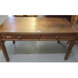 Early 20th Century oak utility design two drawer desk on square legs. (B.P. 21% + VAT)