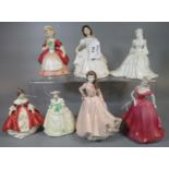 Collection of seven Coalport and Royal Doulton bone china figurines to include; 'Valerie' HN2107, '