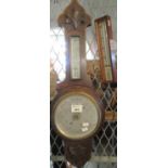 Early 20th century oak aneroid barometer, together with an oak cased wall thermometer. (B.P. 21% +