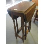 Early 20th Century oak gate leg table of small proportions. (B.P. 21% + VAT)