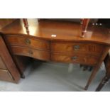 Edwardian style mahogany inlaid serpentine front sideboard on square tapering legs and spade