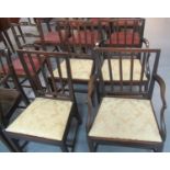 A set of four 19th Century mahogany and oak farmhouse stick back chairs. (2+2) (4) (B.P. 21% + VAT)