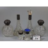 Collection of silver topped ladies vanity items to include globular hobnail cut scent bottles,