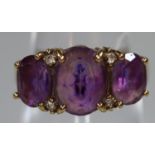 9ct gold three stone amethyst dress ring. Ring size L. Approx weight 3.3 grams. (B.P. 21% + VAT)