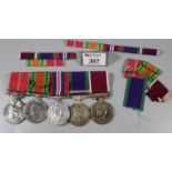 Second World War medal group to include: 1939-45 war medal, Defence medal, Queen Elizabeth II