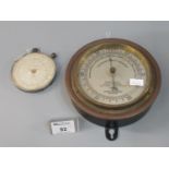 Fowler's Universal Calculator in circular form with printed dial and plated case. Together with a