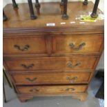 Reproduction mahogany inlaid straight front chest of two short and three long drawers on bracket