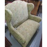 Edwardian style high wing back floral and foliate upholstered two seater sofa. (B.P. 21% + VAT)