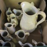 A small box containing a collection of Portmeirion 'British Heritage Collection' parian ware jugs