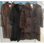 Three vintage fur coats to include; a black astrakhan with mink fur collar, a Pelshandel squirrel