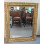 century design gilded mirror with gilt slip, the frame with moulded foliate decoration. 75 x 95cm