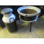 Large cast iron planter of circular form on stand, together with a painted two handled milk