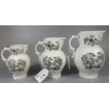 A set of three Royal Worcester porcelain graduated bicentenary 1951 porcelain jugs with mask head