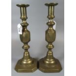 A pair of brass 'The Queen of Diamonds' candlesticks. (B.P. 21% + VAT)