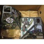 Box containing two Tiffany style ceiling lightshades, florally decorated (not glass). (B.P. 21% +
