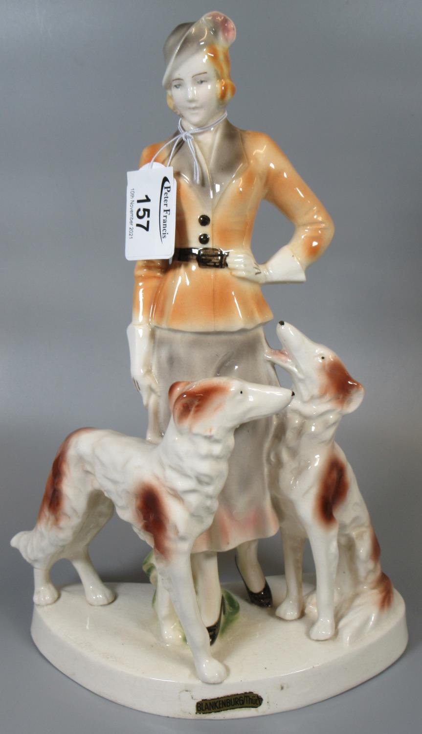 German continental pottery figure group of an Art Deco lady with dog marked 'Blankenburg'. (B.P. 21%