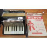 Small Hohner Mignon miniature 8 bass accordion with musical manual book. (B.P. 21% + VAT)
