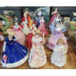 Two trays of china figurines to include; seven Royal Doulton; 'Mary', 'Sharon', 'Bunny's