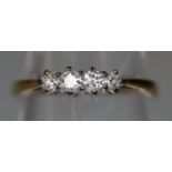 9ct gold four stone diamond ring. Ring size L. Approx weight 1.4 grams. (B.P. 21% + VAT)