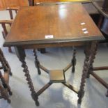Early 20th Century oak barley twist lamp table of square form with under tier. (B.P. 21% + VAT)