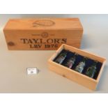 Bottle of Taylor's port in pine box, dated 1976, together with a selection of four fine quality